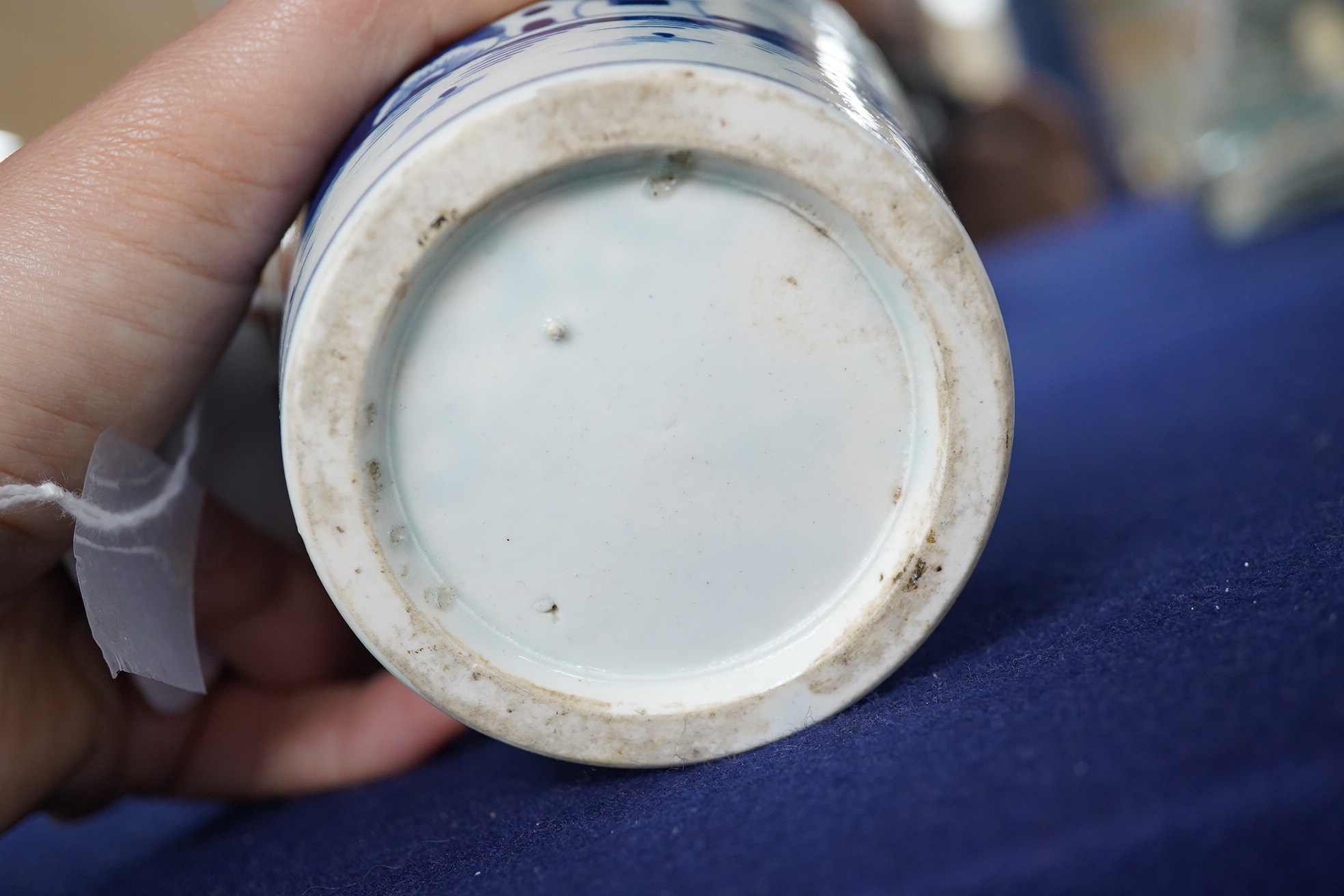 An unusual Liverpool porcelain Cannon Ball pattern conical cup and flat cover, late 18th century, 9cm high. Condition - repaired chip to cover